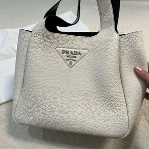 Amazing prada bag barley used purchased in April 2023.